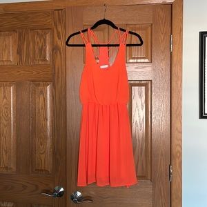 Great Summer Dress. Orange size small dress with fun strap back